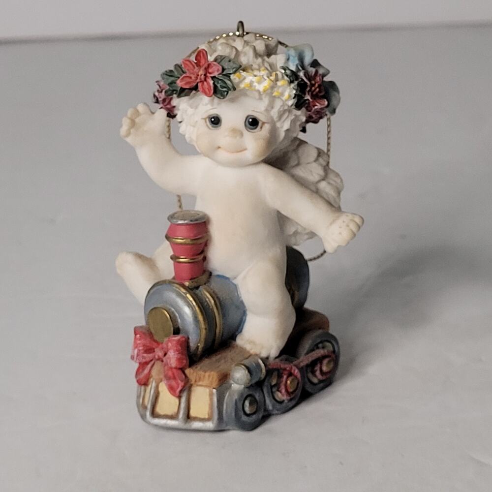 Delightful 1998 Dreamsicles Cherub On Train Figurine 3x2 inches